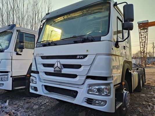Sinotruck HOWO Camião-trator 6*4 em branco 10 rodas para o seu transporte de carga pesada