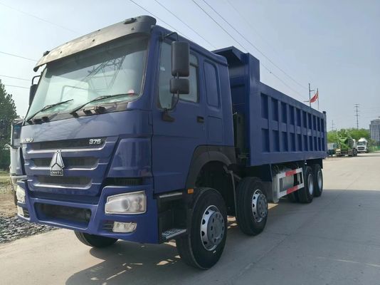 Utilizado HOWO caminhão 8X4 azul escuro Euro3 para descarga pesada na construção urbana